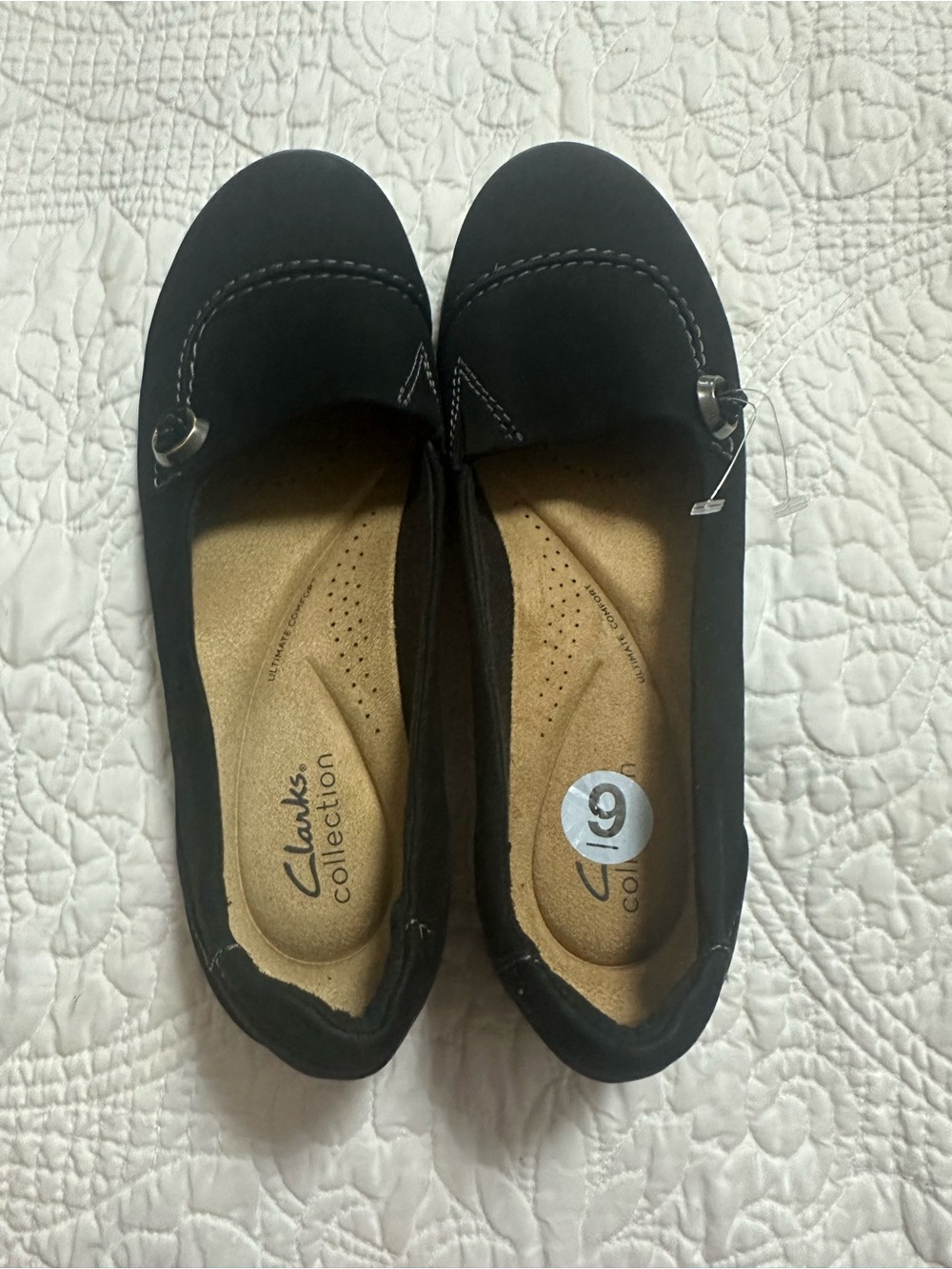 Clarks Women's Black Slip-On Loafers with Silver Accent